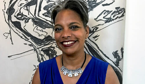 Kymberly Pinder Ph.D. ’95 has been appointed the Dean of the Yale School of Art, seen here with a black and white drawing by Jami Porter Lara. (Photo by Eve Caughey)